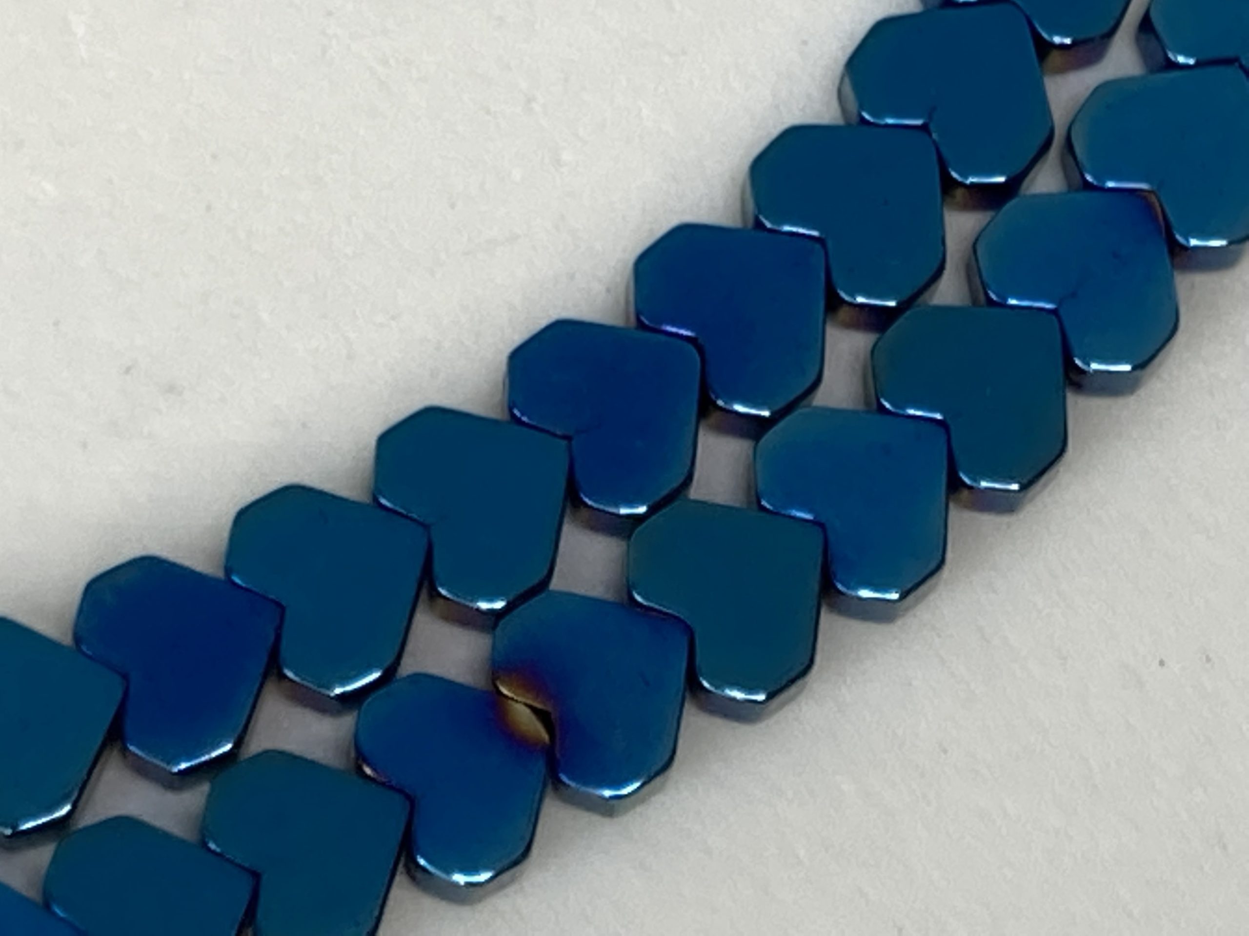 metallic blue hematite heart beads