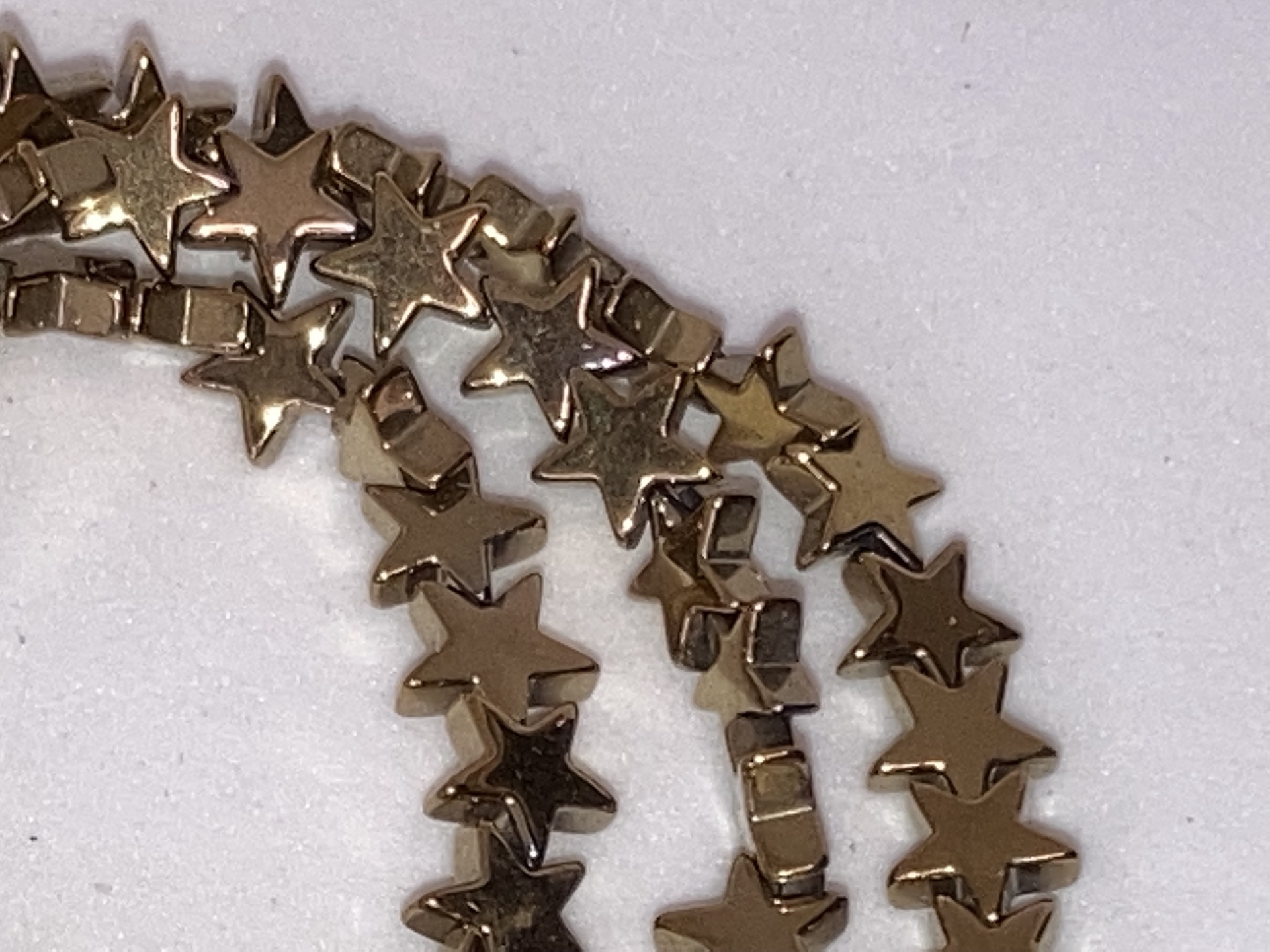 Gold Heamatite star beads