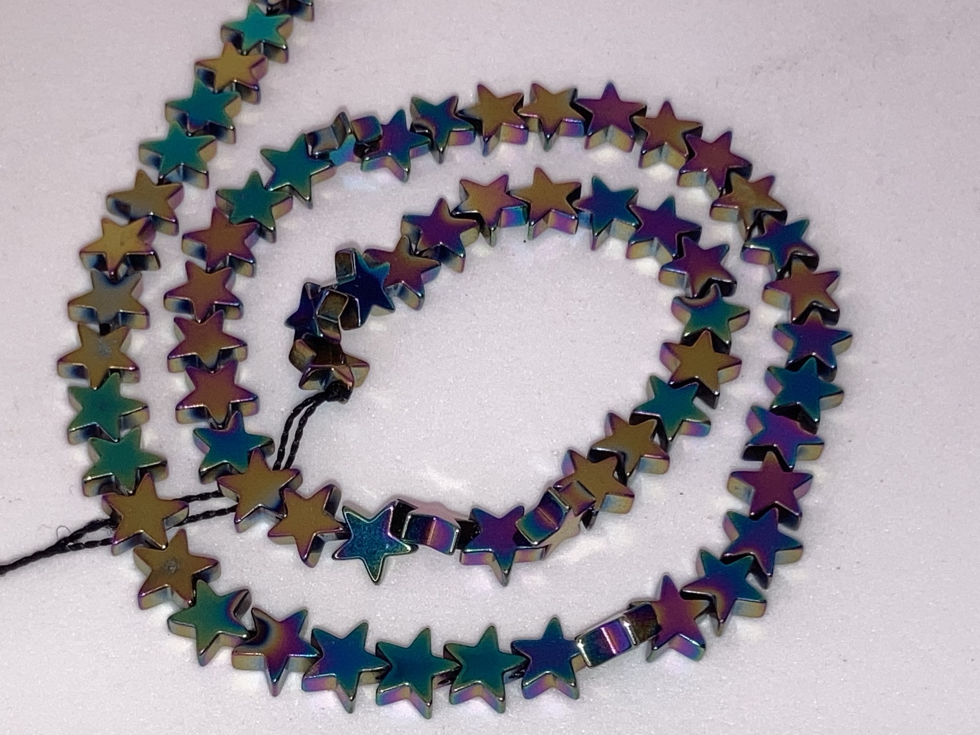 Rainbow heamatite star beads