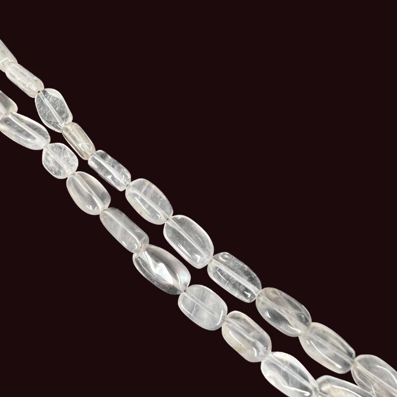 clear quartz oval bead string closeup