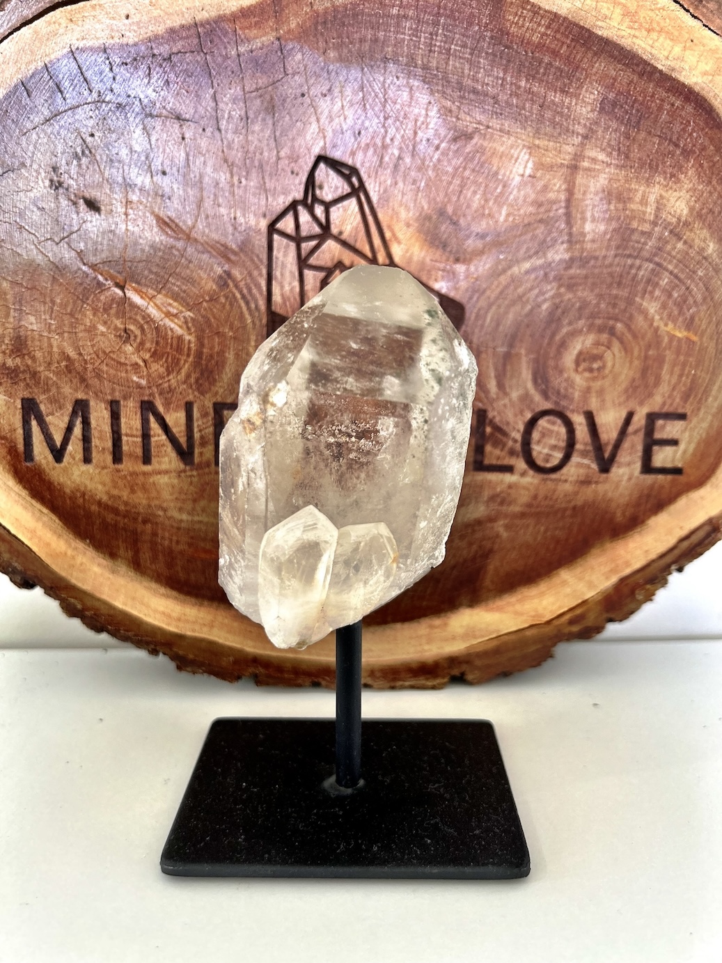 clear quartz on a stand